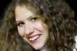 Young woman with long brown nature hair