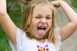Girl makes faces imitate witch
