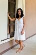 Brunette in white dress