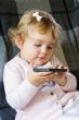 Cute infant with cellular