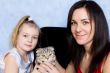 Mother, daughter and grey kitty