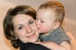 Kissing son with mother