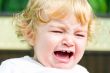 Cute infant with tear