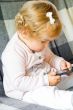 Cute infant with cellular