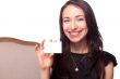 Smiling young woman holding blank businesscard