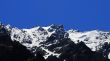 Caucasus mountains under snow and clear blue sky