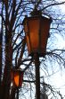 Retro street lamp shining at the twilight