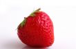 Healthy red strawberry fruit sliced isolated on the white backgr