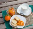 Homemade tangerine marmalade on the small square dessert plate