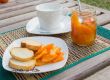 Homemade tangerine marmalade on the small square dessert plate