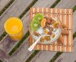 Healthy dessert and a glass of orange juice