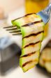 grilled zucchini courgette on a fork
