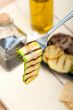 grilled zucchini courgette on a fork