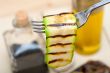 grilled zucchini courgette on a fork