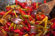 fried chili pepper and vegetable on a wok pan