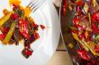 fried chili pepper and vegetable on a wok pan