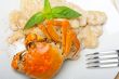 Italian gnocchi with seafood sauce with crab and basil