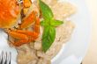 Italian gnocchi with seafood sauce with crab and basil
