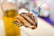 grilled onion on a fork