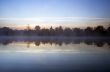 Foggy morning landscape in the autumn park near the lake. Vintag