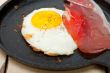 egg sunny side up with italian speck ham