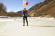 Fun girl with balloons on the hair 