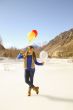 Funny girl with balloons on the hair