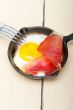 egg sunny side up with italian speck ham