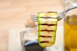 grilled zucchini courgette on a fork