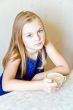 Cute girl drinking beverage