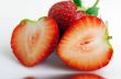 Healthy red strawberry fruit sliced isolated on the white backgr
