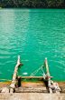 Ladder made of wood into the water