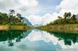 Water surface reflecting sky and cloud