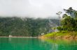 Beautiful high mountains and green lake