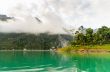 Beautiful high mountains and green lake