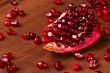Single Pomegranate Part on the Wood