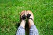 feet in green grass 