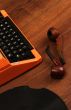 The Orange Vintage Typewriter on the Wood
