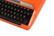 The Orange Vintage Typewriter the White Background