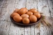  fresh brown eggs in plate