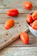fresh tomatoes in metal bowl 