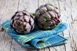 two fresh artichokes