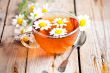 cup of tea with chamomile flowers