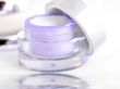 Closeup of jar of moisturizing face cream. Open container of cre