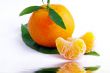 Tangerine with leaves on a white background