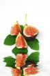 Fresh figs on white background