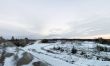 Panorama of an abandoned stone pit in winter 