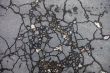 Cracked asphalt surface