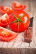 fresh tomatoes and knife
