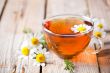 cup of tea with chamomile flowers 